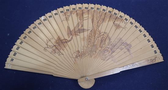 A Chinese penwork sandalwood fan